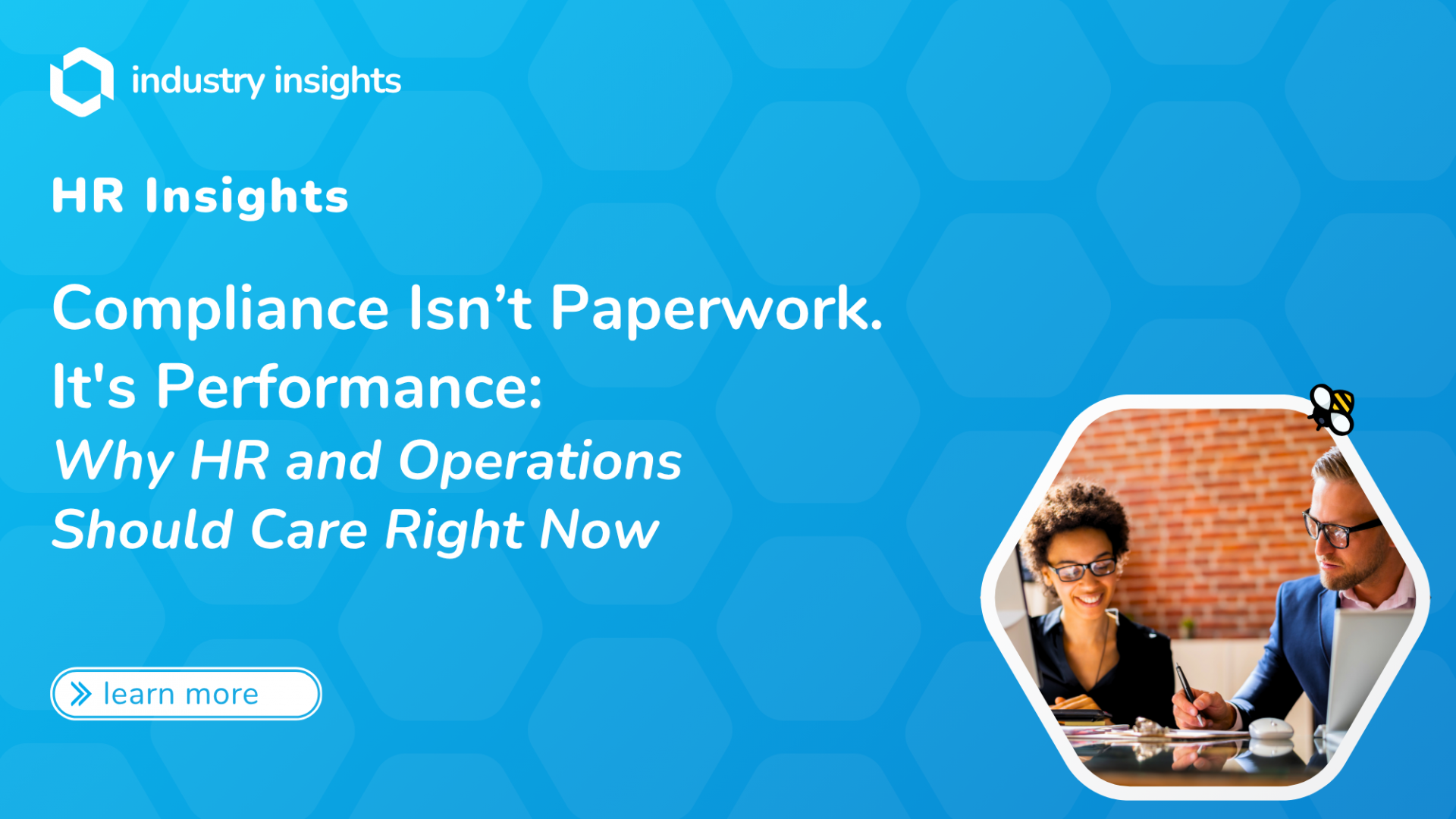 Two HR professionals in a modern office discussing compliance strategy, representing the performance-driven approach to occupational health and operations.