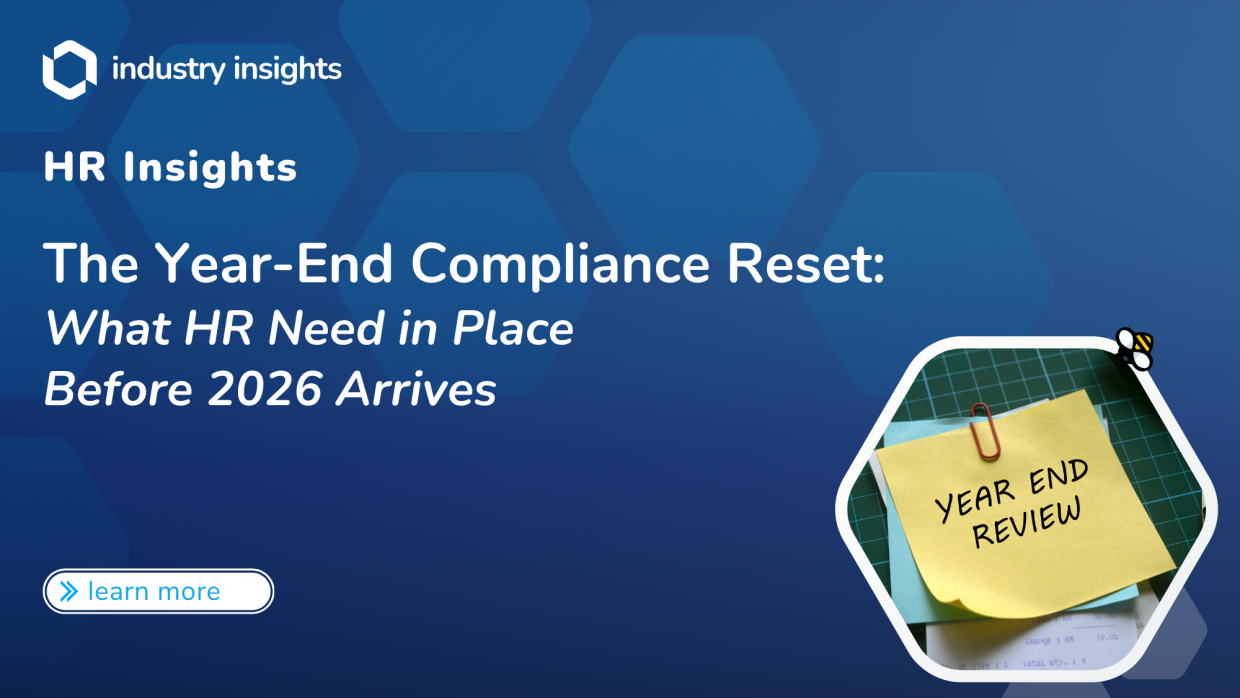 "Sticky note labeled 'Year End Review' clipped to documents, highlighting HR compliance planning for 2026 preparation"